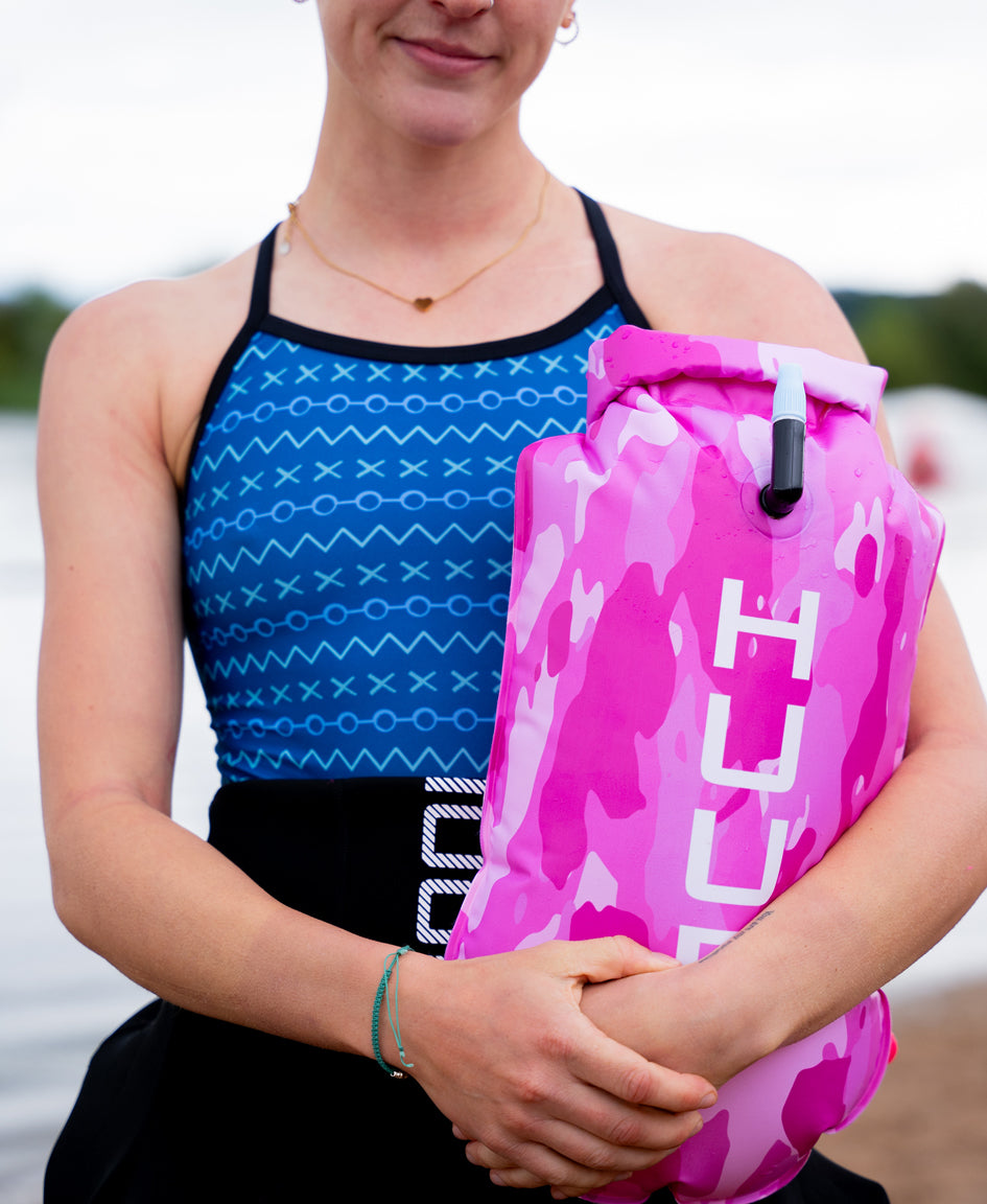 UUB Safety Tow Float pink camo inflatable open water swim buoy, 16L waterproof with waist belt and whistle
